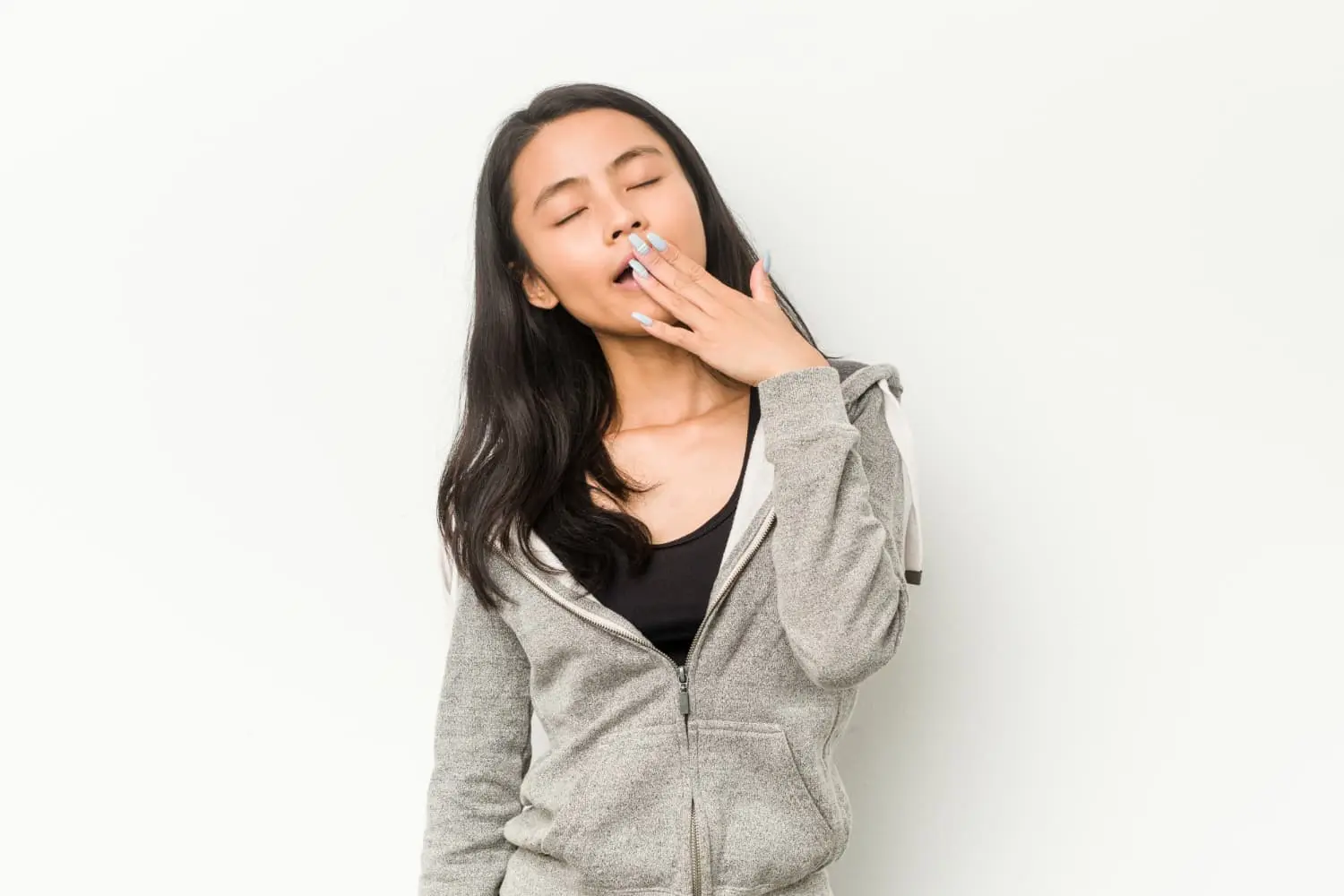 Young woman undergoing orthodontic treatment to address mouth breathing issues